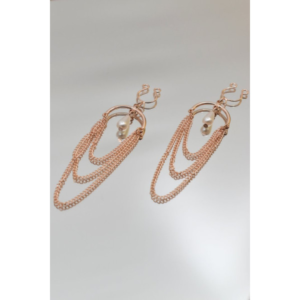 Bijoux de seins avec 3 chainettes doré rose et une perle 